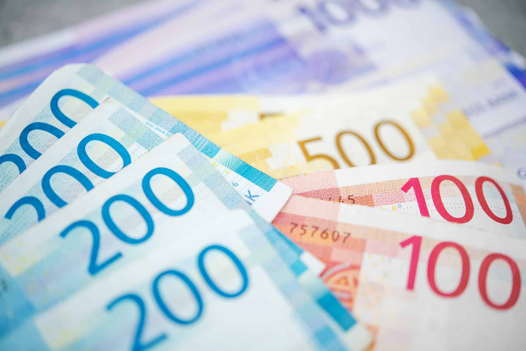 Norwegian Krones Banknotes on a Table