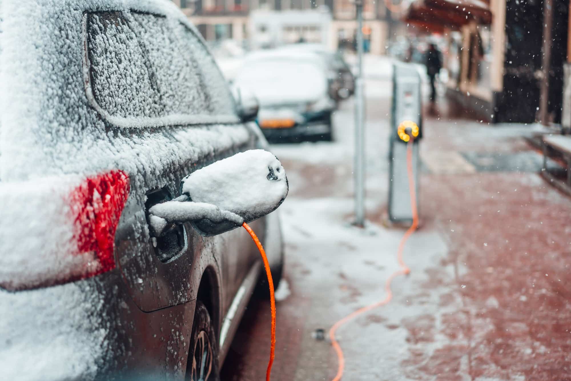 Electric car plug charging in the winter